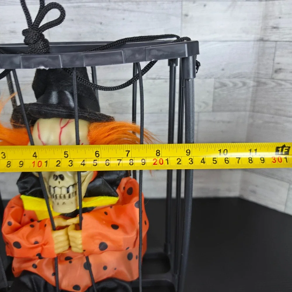 Halloween Animated Skeleton Clown in Cage Hanging Prop Orange Black Skull Decor